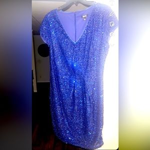 Purchased this party dress for a wedding. Was worn for 2 hours.